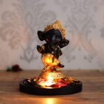 Golden and Black Lord Ganesha Dancing Avatar Decorative Showpiece