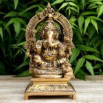 Yellow With Black Lord Ganesha Sitting Idol On A Throne Made of Brass