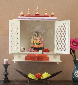 wooden wall mounted pooja mandir in red & white